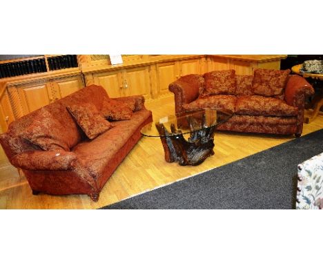 Two red upholstered two seater sofas, with floral decoration, 70cm high x 180cm wide (2)   CONDITION REPORT:  Lot 591 - two s