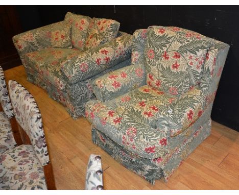 A vintage two seater sofa with matching armchair, upholstered in later green and cream floral fabric, settee 162cm wide (2)