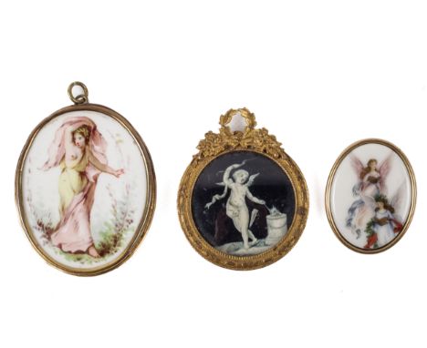 A 19th century 'Grand Tour' miniature of Cupid on a black ground and two oval porcelain panels. The first within a gilt frame