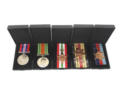 A group of five WWII medals. Comprising: Stars for North Africa (8th Army bar), Italy and 1939-45, and Defence and War medals