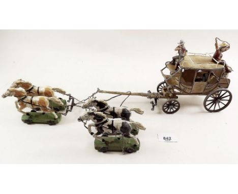 A German 1950's composition and plastic toy stage coach with cowboy figures and horses