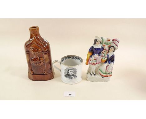 A treacle glazed flask, a Victorian mug printed Cobden and Bright and a Staffordshire group 