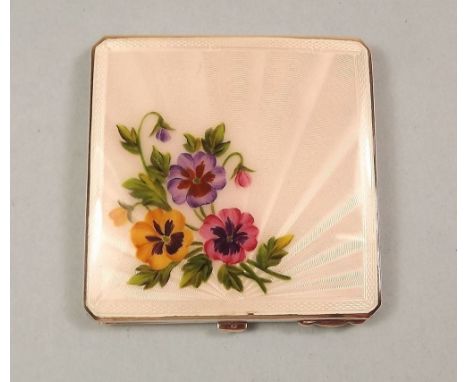 A silver and enamel floral compact 