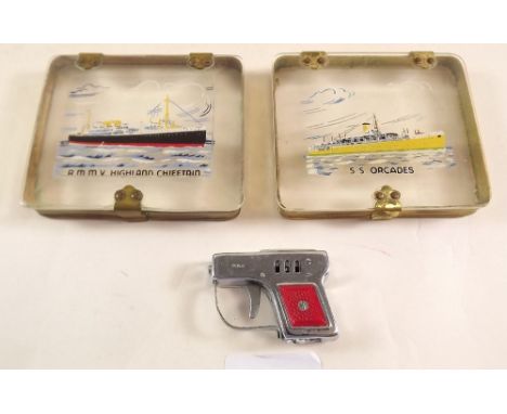 Two perspex shipping vintage cigarette cases for S S Orcades and RMMV Highland Chieftain and a novelty pistol cigarette light