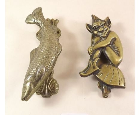 A vintage brass pixie door knocker and fish form one 