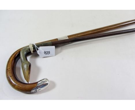 A silver mounted walking stick and a horn handled cane 