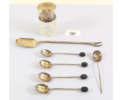 A silver pickle fork/spoon Edinburgh, five coffee bean spoons and a silver topped dressing table jar