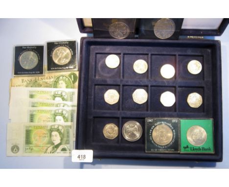 A velvet blue coin case including green £1 banknotes, cashiers L K O'Brien, J S Fforde, J B Page and D H  F Somerset, 6 total