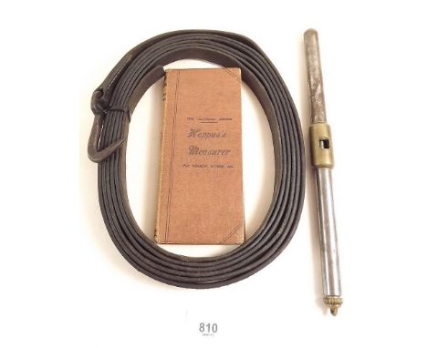 A vintage leather tree girth measuring strap, a Swedish core boring tool and a Hopus measure ready reckoner 