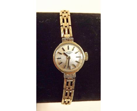 A 9 carat gold Rotary wrist watch and 9 carat gold strap 