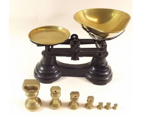 A set of kitchen scales and weights