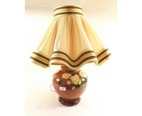 A table lamp painted yellow roses and shade 