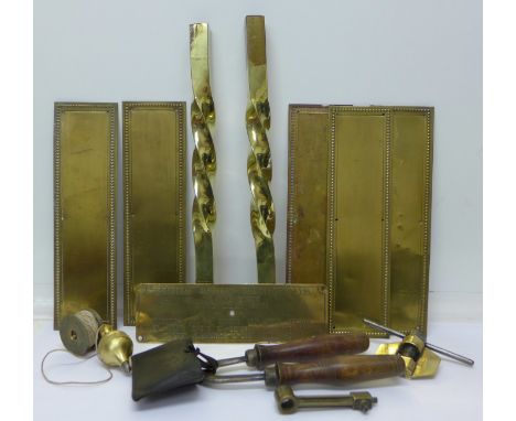 A brass plaque, British United Traction Ltd., five door plates, tools and two columns