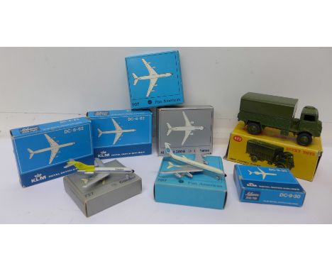 Seven boxed Schuco aircraft and 623, Dinky Army Covered Wagon, boxed
