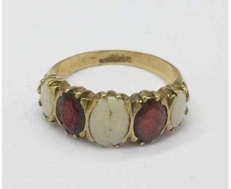 A 9ct gold, garnet and opal ring, a/f, 3.8g, S