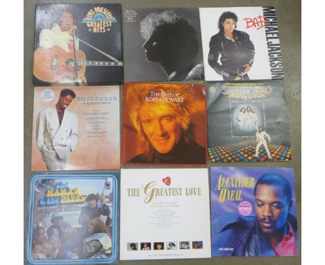 A boxed set of Elvis Presley's Greatest Hits and other LPs including Barbara Streisand, Michael Jackson, Rod Stewart, Billy O