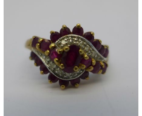 A 9ct gold, diamond and ruby ring, 2.9g, M