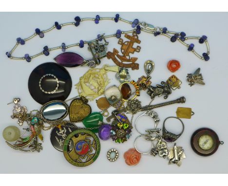 Jewellery including silver, a compass fob, badges, tortoiseshell, unmounted stones, etc.