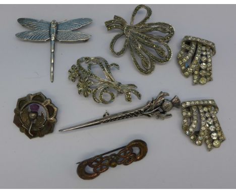 Brooches and a clip including marcasite and Celtic, one lacking stone