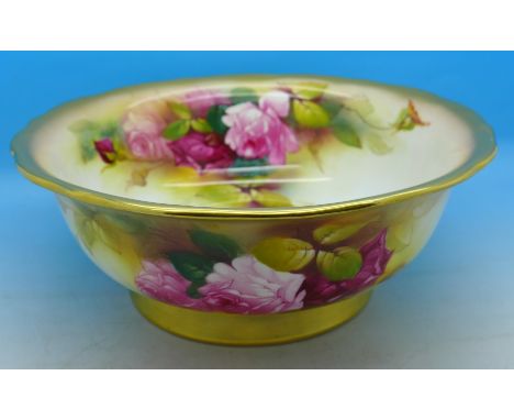 A Royal Worcester bowl, hand decorated inside and out, signed Spilsbury, diameter 23cm