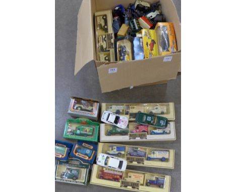 A collection of Lledo Days Gone model vehicles including box sets