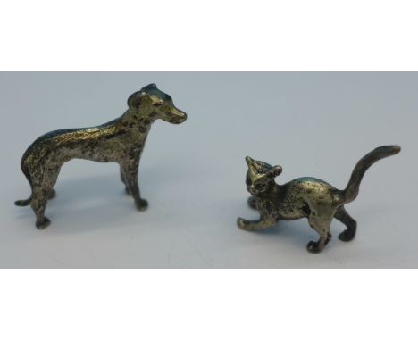 A cast silver miniature cat and dog, marked sterling