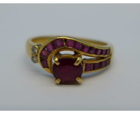 An 18ct gold, diamond and ruby ring, 3.5g, M