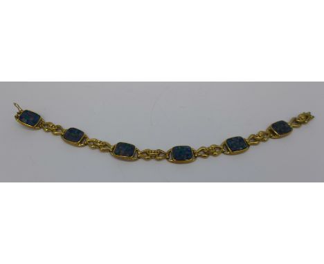 A 9ct gold and opal bracelet, 11.7g