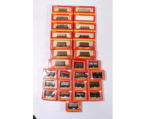 Hornby OO gauge model railways rolling stock including: R6327A Wemyss plank wagon; R6122 The Distillers Company Ltd; R6326B T