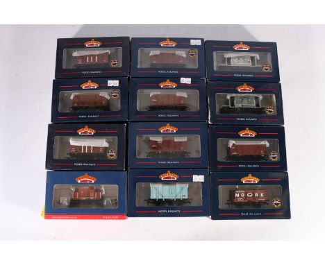 Eleven Bachmann Branchline OO gauge model railways wagons and other rolling stock including 37080S 7 plank end door wagon Moo