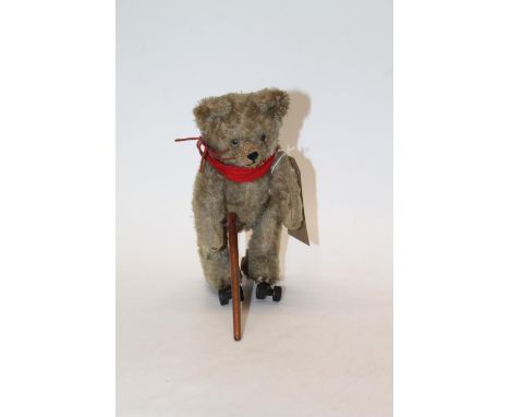 1950's US Zone Germany Schuco Rolly clockwork automaton mohair teddy bear modelled with walking stick and on roller skates, 1