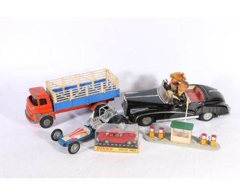 Dinky Toys 116 Volvo 1800S boxed, a Dinky Toys 782 Petrol Pump Station Shell, a Chinese made battery operated ME630 Photoing 