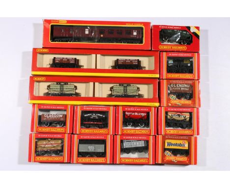 Hornby Railways OO gauge model railway rolling stock including: R6193 2x14 ton tank wagons; R6192 2x7 plank wagons; R891 brak