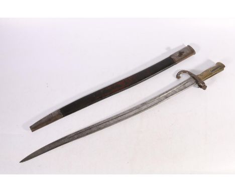 French 1866 pattern sword bayonet with spine marked for St Etienne April 1868, blade length 57cm, bayonet length 70cm, with a