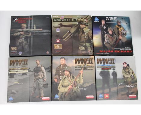 Four DiD Corporation WWII Series 1/6 scale collectable action figures including: US 2nd Ranger Battalion Captain Millers; US 