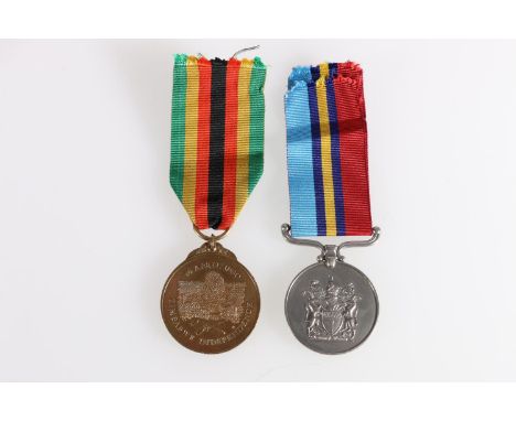 Medals of 21070 Constable Mugwagwa comprising Rhodesia General Service medal [21070 CONST MUGWAGWA] and a Zimbabwe Independen