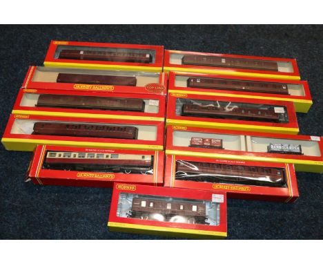 Hornby OO gauge model railways rolling stock including: R4134B BR mk1 sleeper coach M2064; two R4204A BR mk1 parcels coaches 