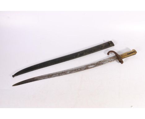 French 1866 pattern sword bayonet with spine marked for St Etienne 1871, blade length 57cm, bayonet length 70cm, with a scabb