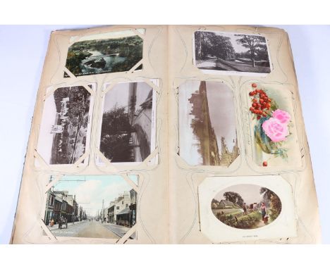 An Edwardian Art Nouveau style postcard album containing around 80 postcards, mostly of topographical interest including Glen