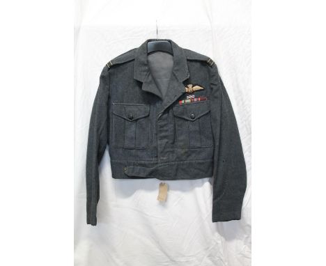 British Royal Air Force uniform, a blue jacket with H Edgard and Sons Ltd label "War Service Dress Blouse New Pattern Size 14