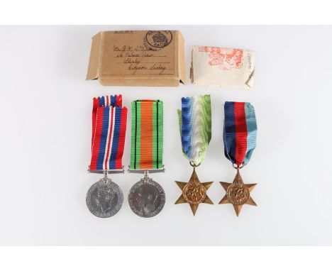 Medals of B4777 Sub Lieutenant J M W Dean of the Royal Naval Volunteer Reserve, comprising WWII war medal, Atlantic star, 193