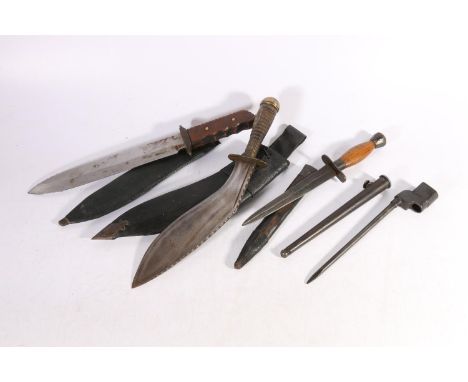 British spike bayonet for the no4 rifle, a kukri type knife, a hunting style knife with applied Scottish button and a dagger 