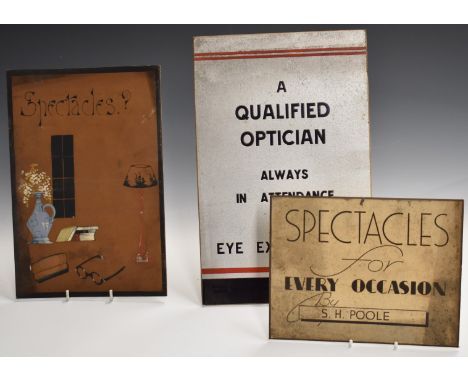 Three vintage card optician's shop display advertising boards, two advertising spectacles, one named S.H. Poole, the other sa