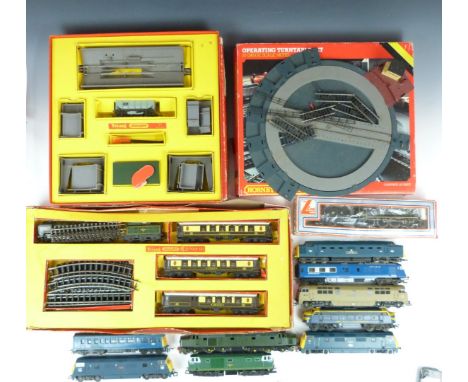 Thirteen Hornby, Tri-ang, Lima and similar 00 gauge model railway locomotives, train sets and accessories including Western E