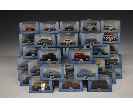 Fifty-seven Oxford Automobile Company 1:76 scale diecast model vehicles, all in original display boxes.&nbsp;