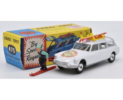 Corgi Toys diecast model Citroen Safari Corgi Ski Club with white body, green interior, yellow roof rack, red skis and poles 