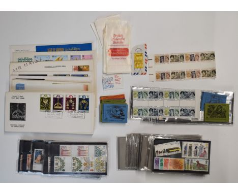 A quantity of mint GB stamps on stockcards, booklets, Bahrain first day covers etc