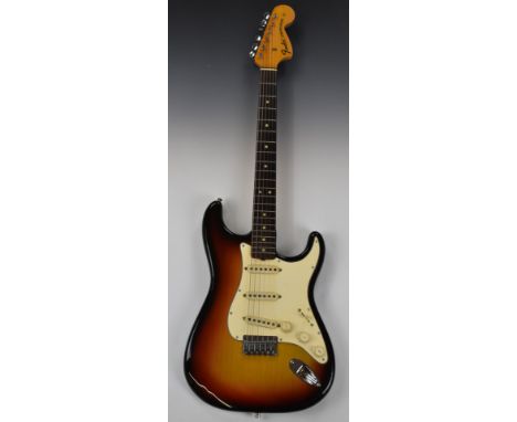 Fender 1969 Stratocaster hardtail electric guitar in lacquered sunburst finish, reg no 273114, in hard carry case