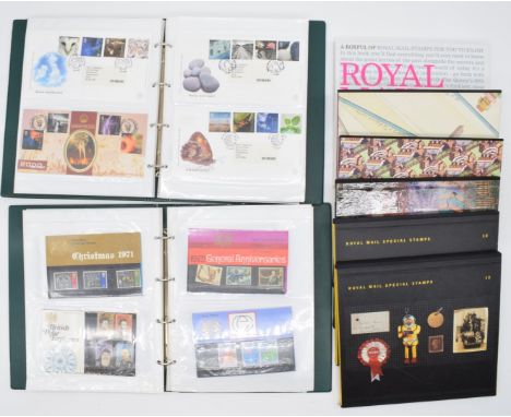A large modern mint GB postage stamps collection in presentation packs, on stockcards, nine yearbooks to 2006, prestige bookl
