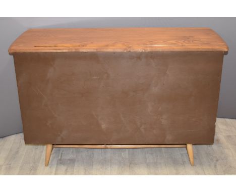 Ercol style retro / mid century modern light elm panelled sideboard raised on slender tapering legs, W130 x D50 x H87cm